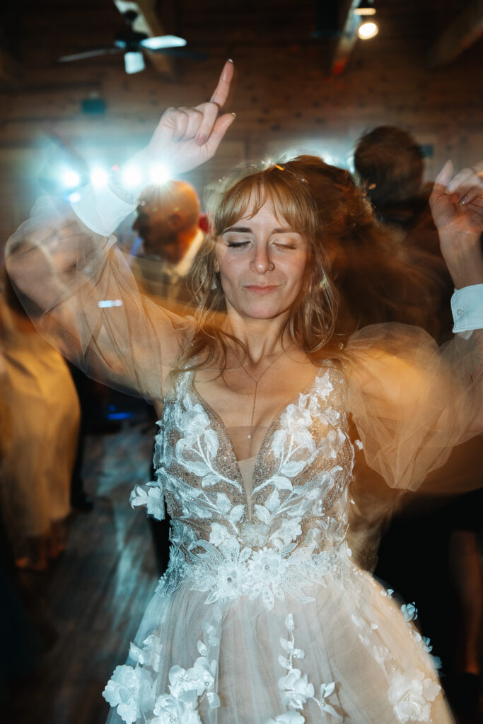 bride dancing at reception at the ridges resort