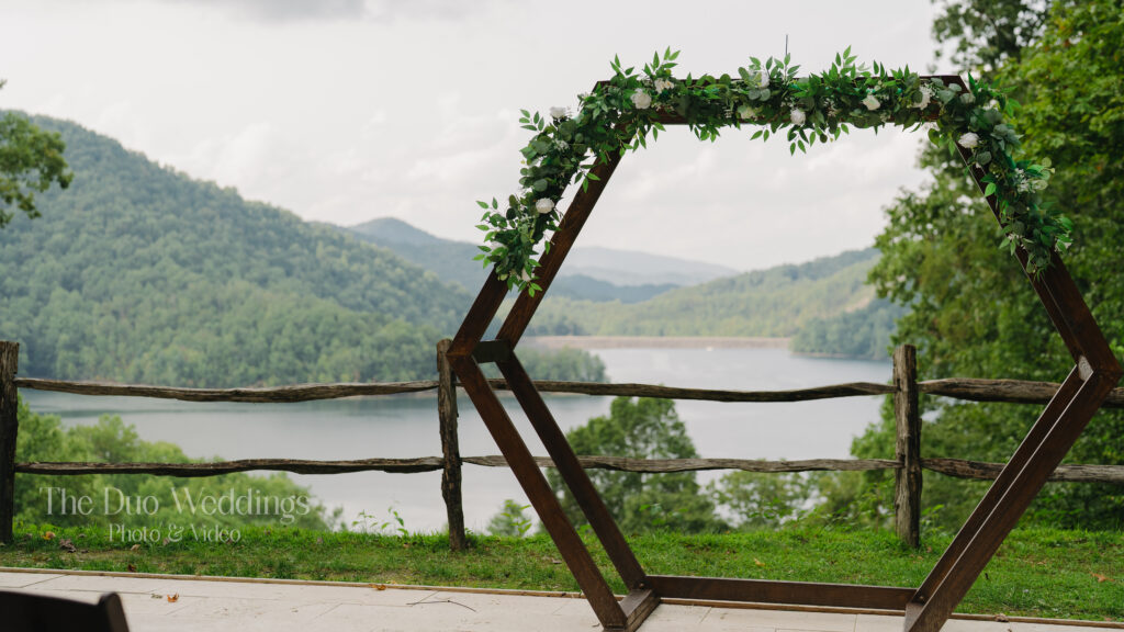 Ceremony at Nantahala Wedding Venue North Carolina with mountain backdrop.