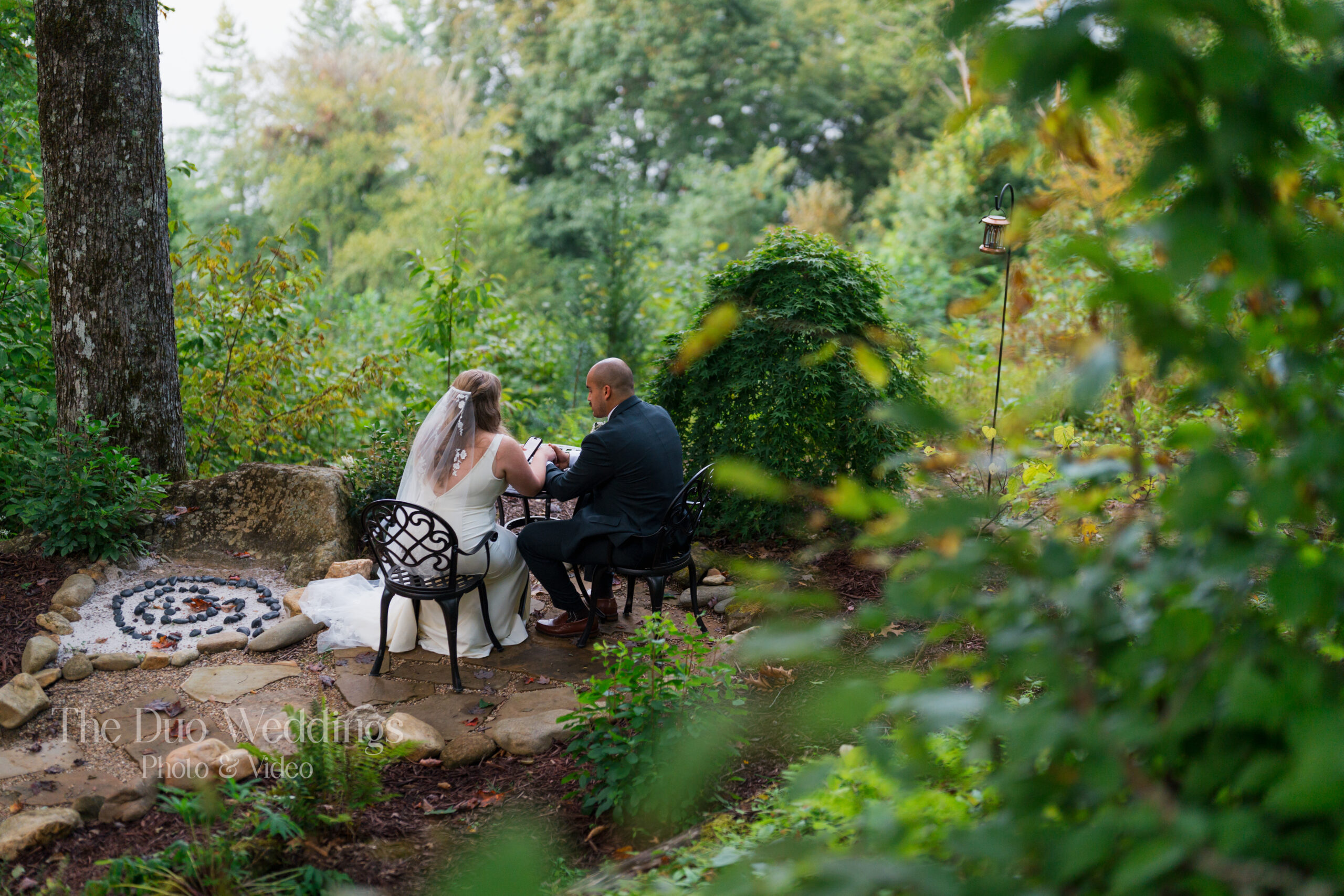 couple reading private vows at Nantahala wedding venue in north carolina