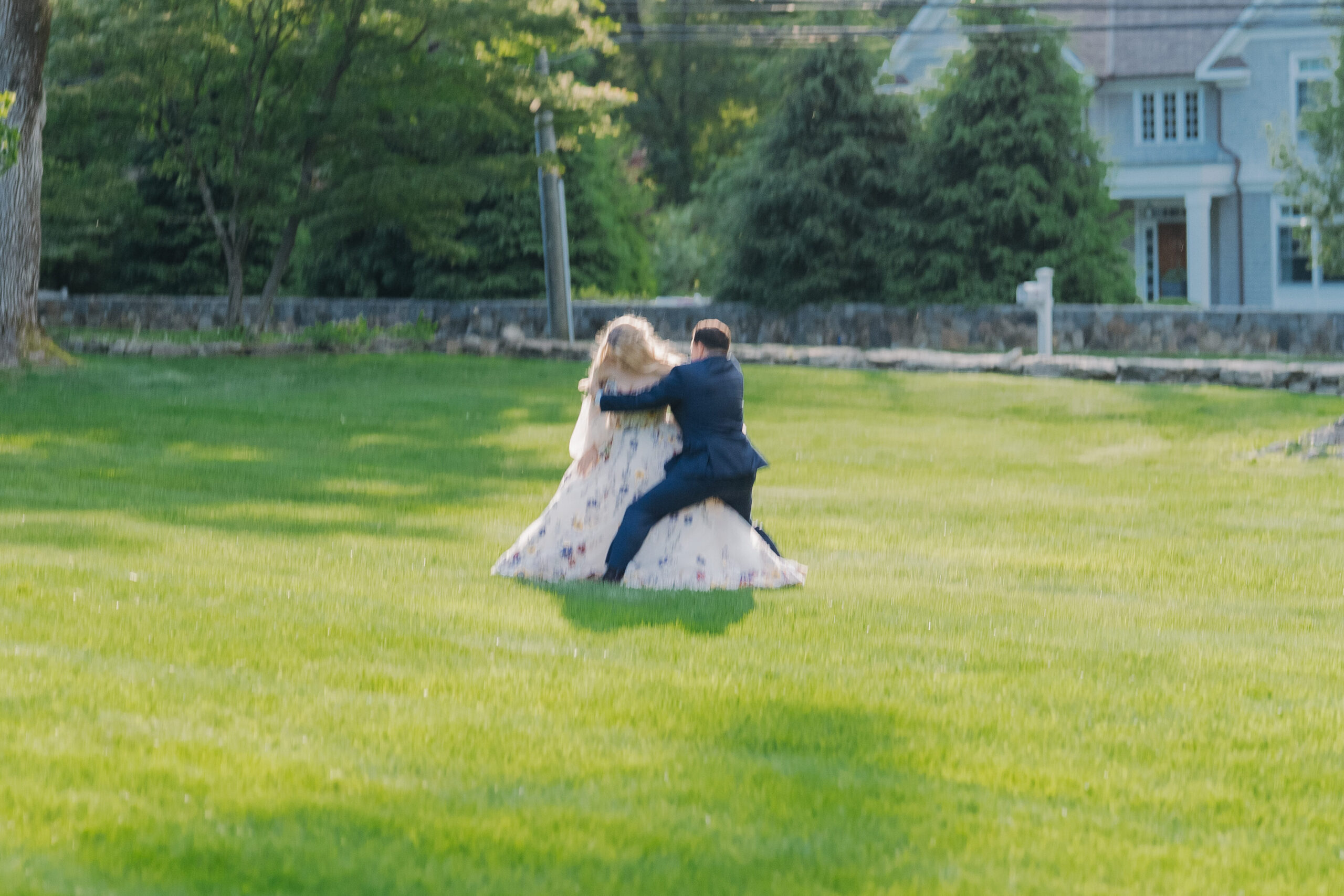 Groom losing balance at wedding venue, at The Meadowlands at the Darien Community Association.