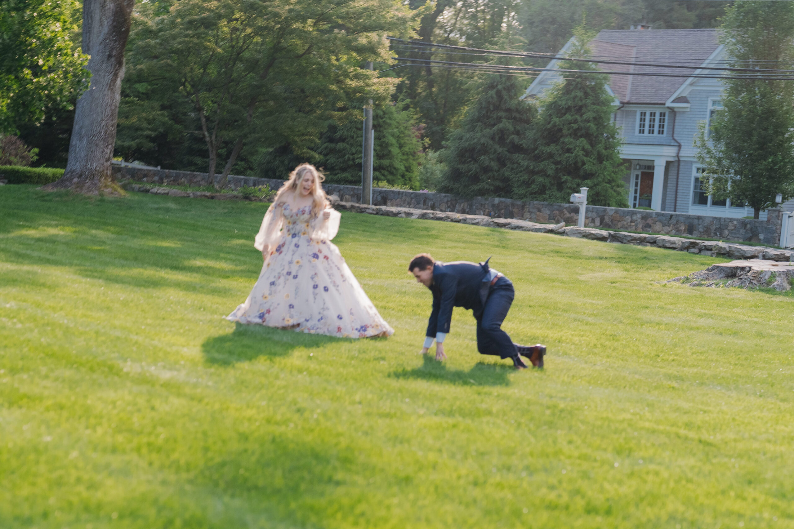 Groom falling down at the wedding venue, at The Meadowlands at the Darien Community Association.