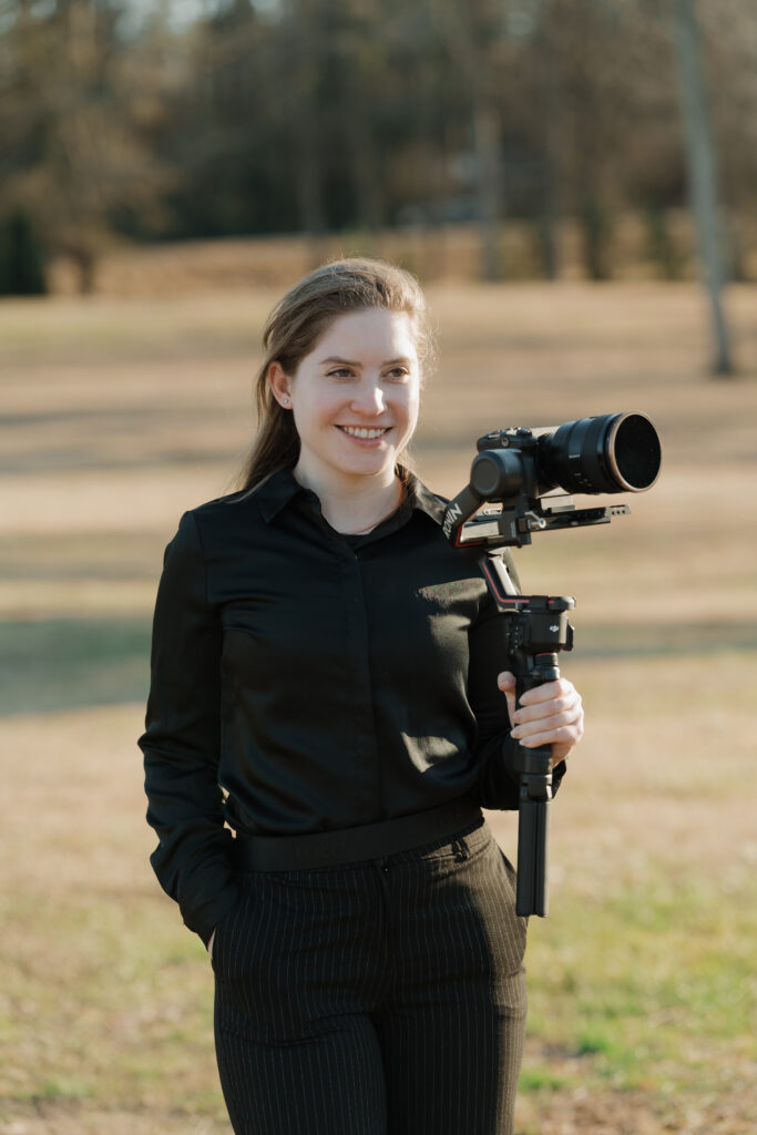 Wedding Videographer posing at Mystic Acres wedding venue in Griffin, GA.