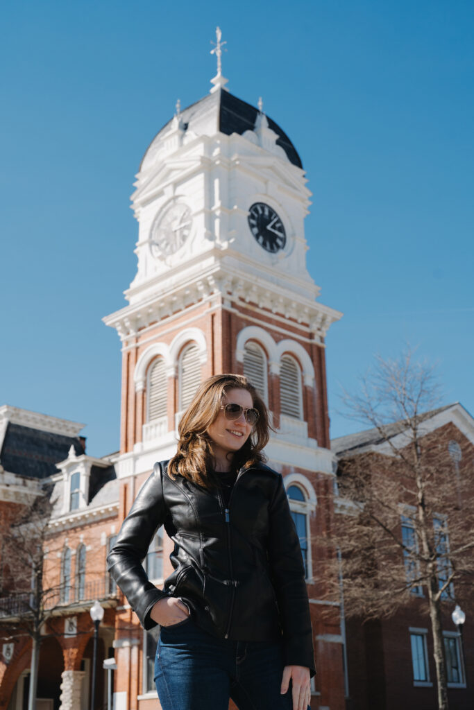 Wedding photographer in Mystic Falls square in Covington, GA near the historic clocktower