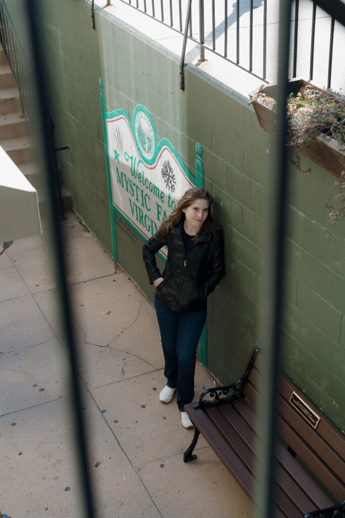 Photographer exploring the alleyway beside Mystic Grill in Covington, GA