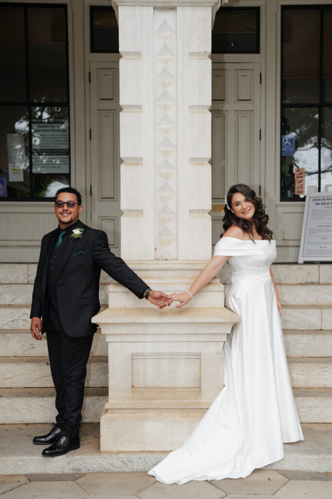 Couple posing in Mystic Falls square in Covington, Georgia