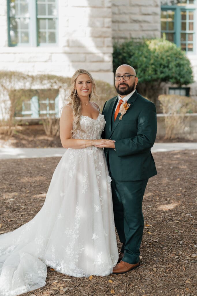 Bride and Groom holding each other at Vecoma at the yellow river, in Snellville, Georgia.