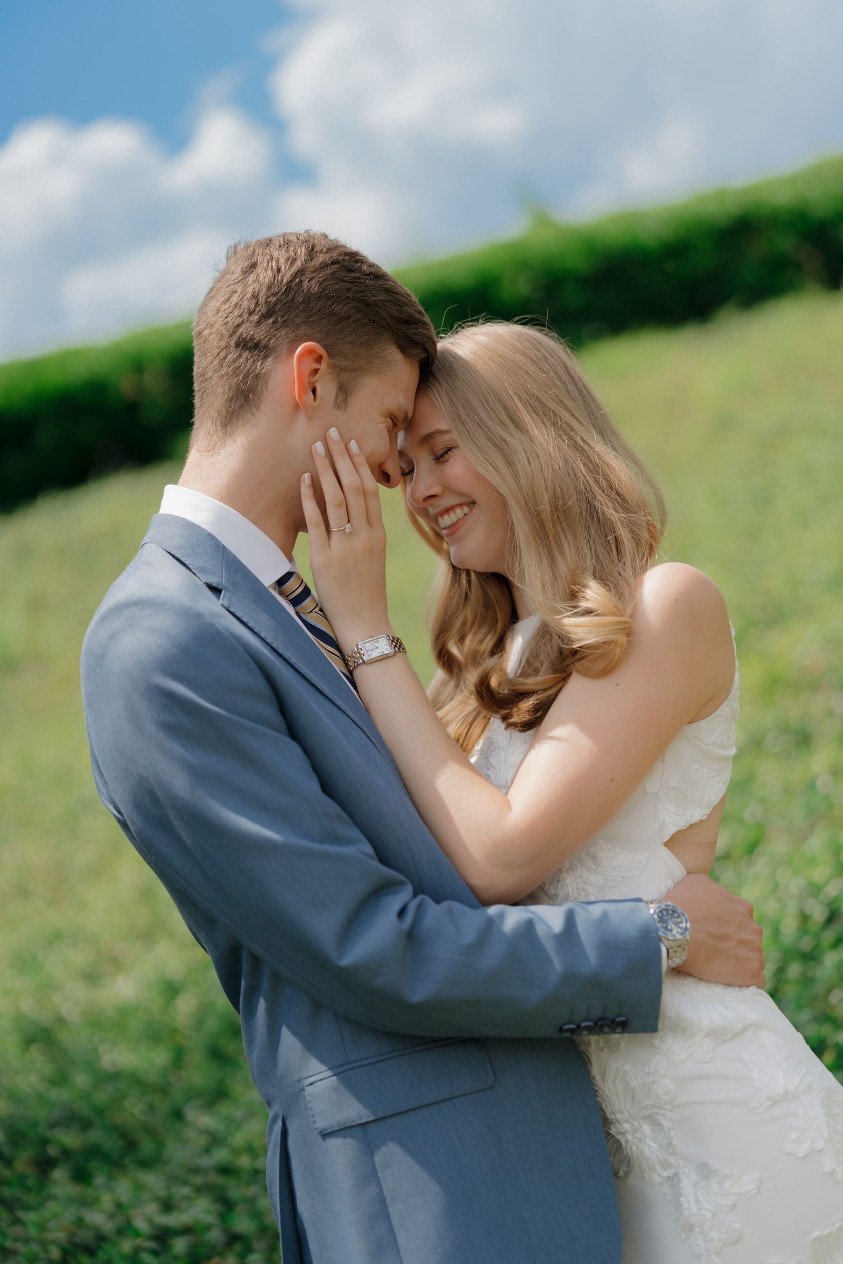 couple posing at tpc sugarloaf for their engagement session